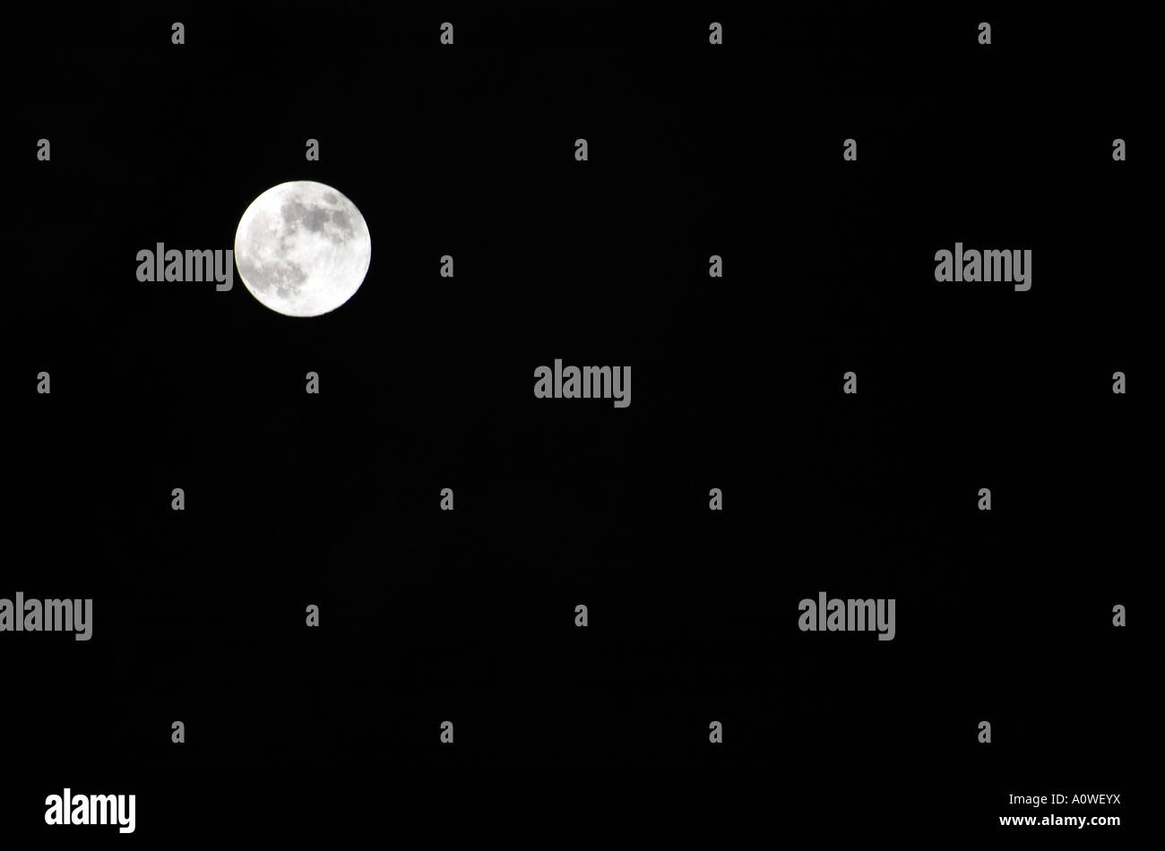 Full moon in night sky Stock Photo - Alamy