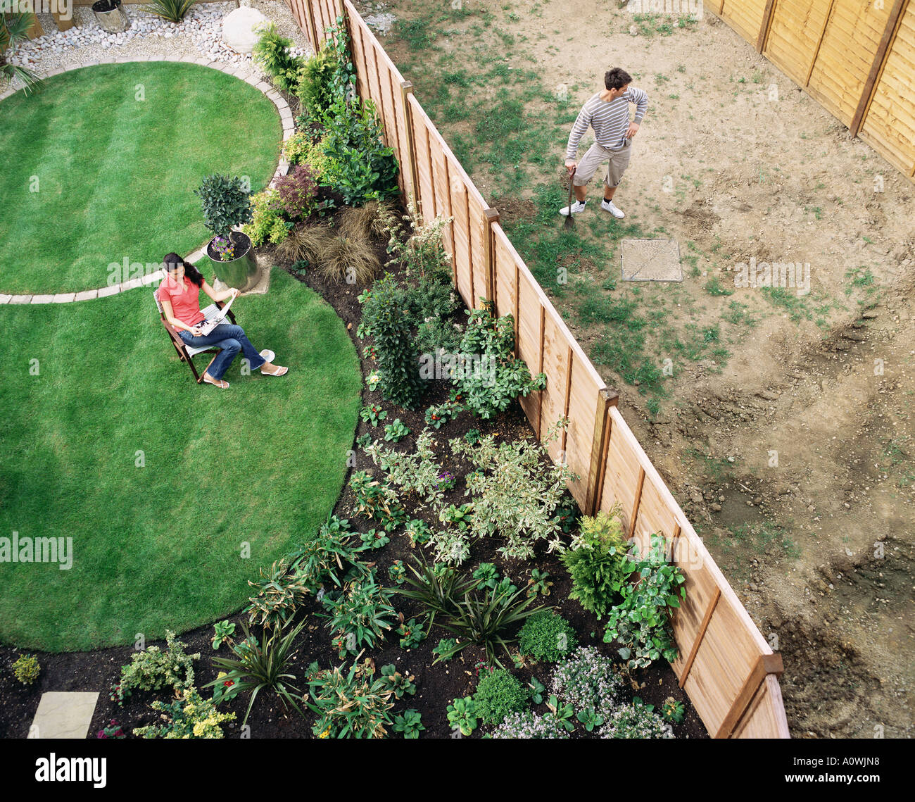 Neighbours in their gardens Stock Photo Alamy