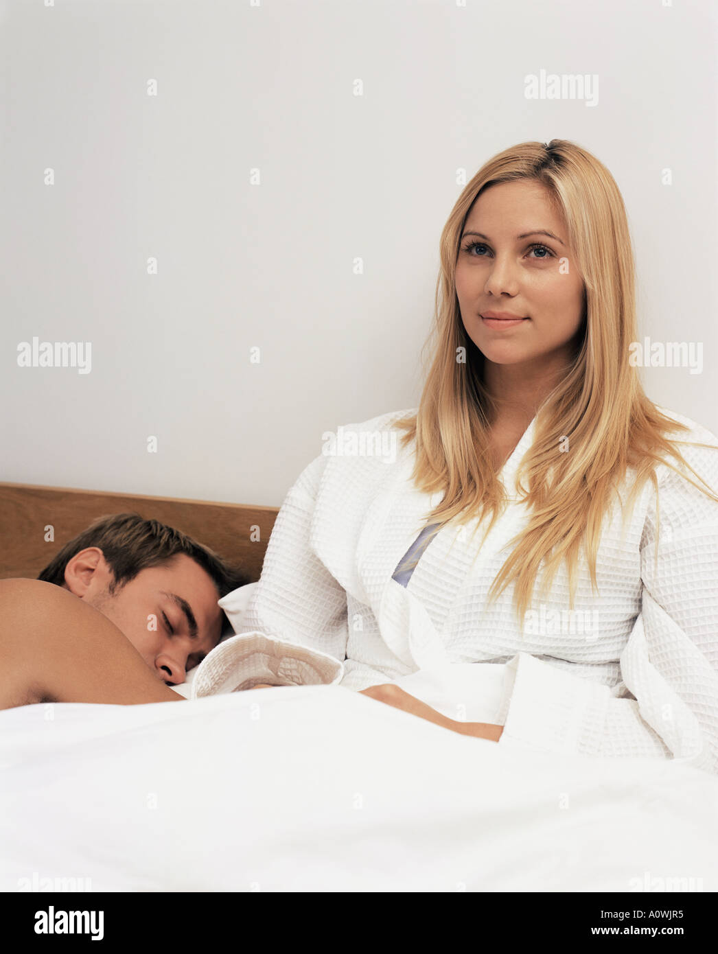 Young couple in bed Stock Photo Alamy