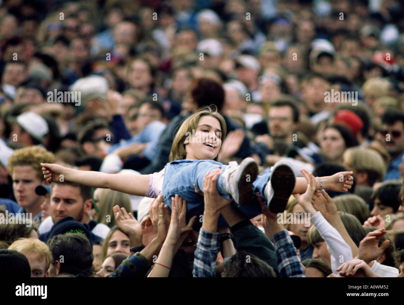 Crowd surfing at an outdoor concert on Boston Common Stock Photo