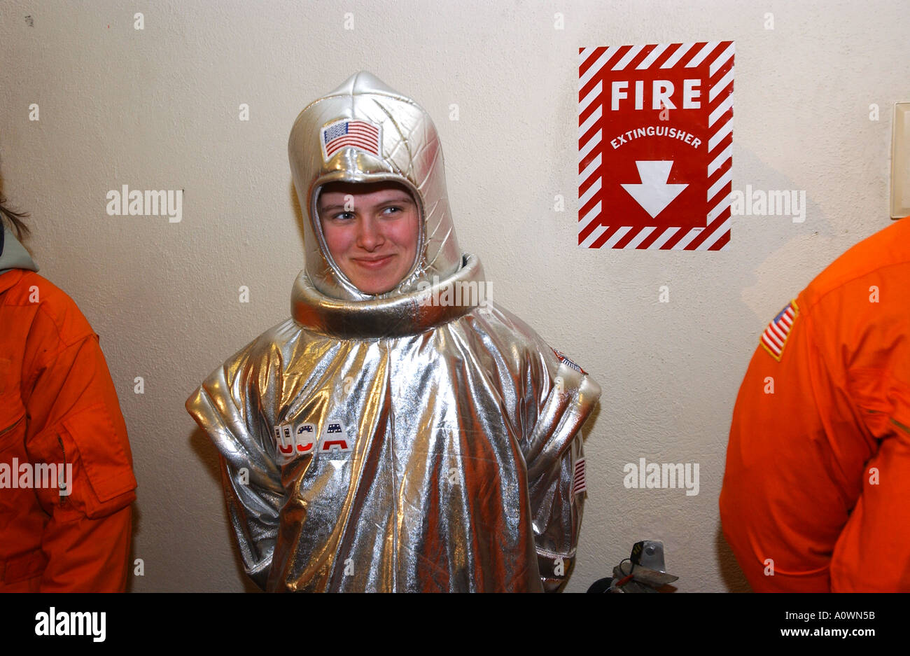 Humor a woman dressed in a silly space suit attends a political function at the New Hampshire Primary Stock Photo