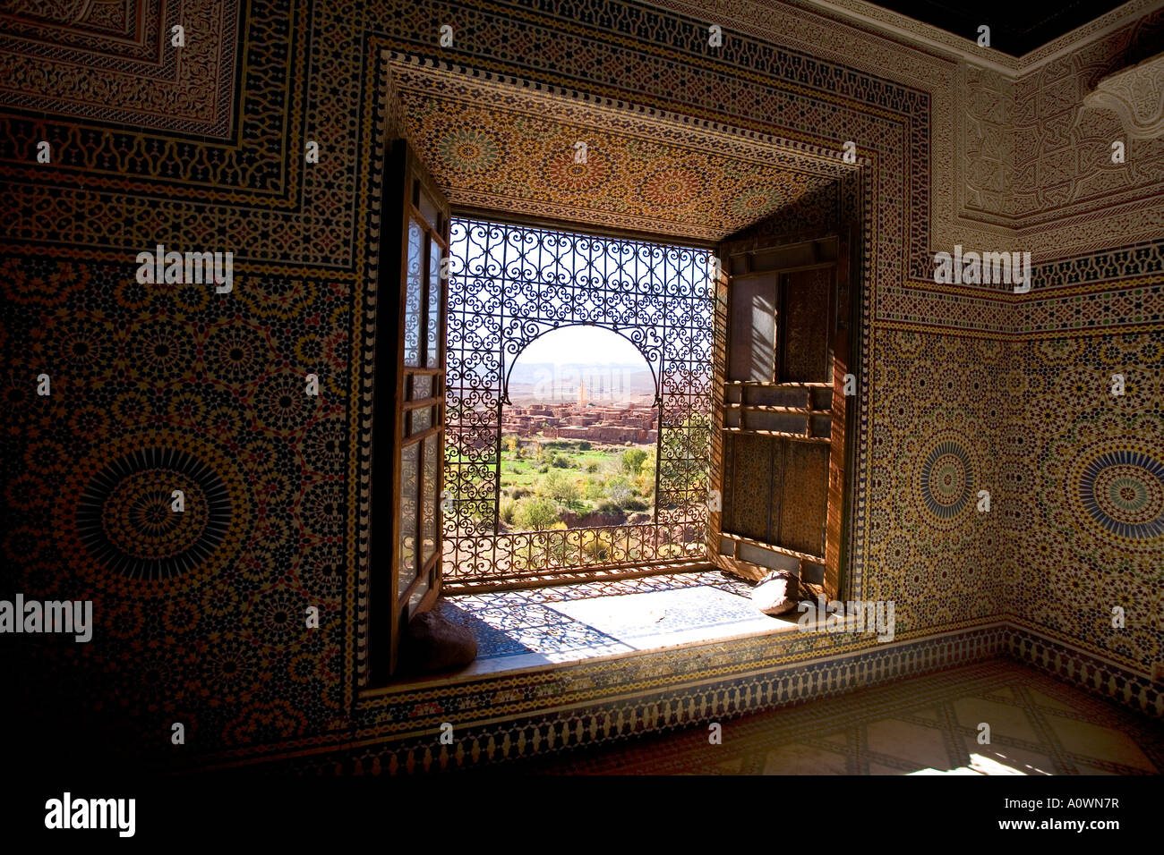 Window looking out at the Al-Thami el-Glaoui Kasbah near Telouet in Morrocco Stock Photo