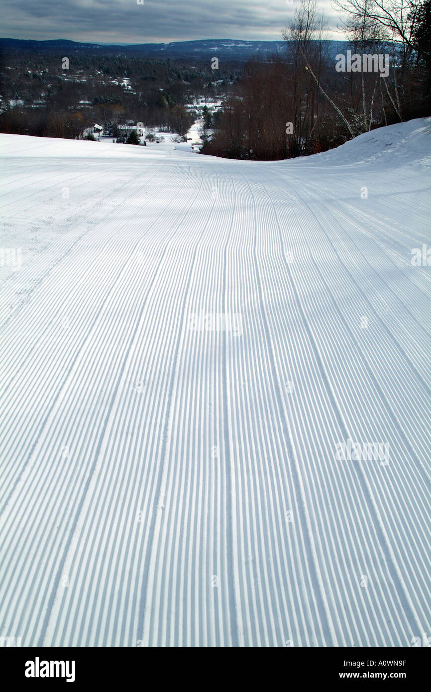 Groomed snow on a ski slope Stock Photo