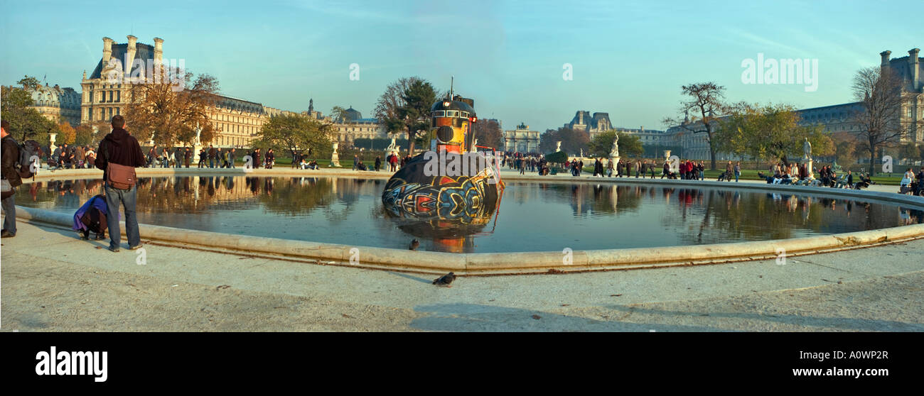 Paris France 'Public Parks' 'Tuileries Park' in Autumn People Promenading Submarine Sculpture in Pond 'Panoramic VIew' Stock Photo