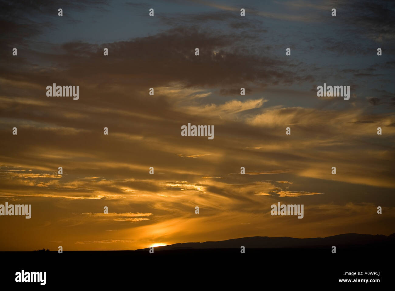 Sunset clouds in the sky background Stock Photo - Alamy