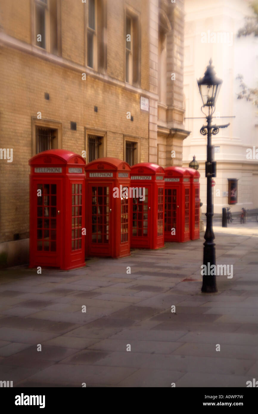 Row of old fashioned telephone boxes in London England Stock Photo