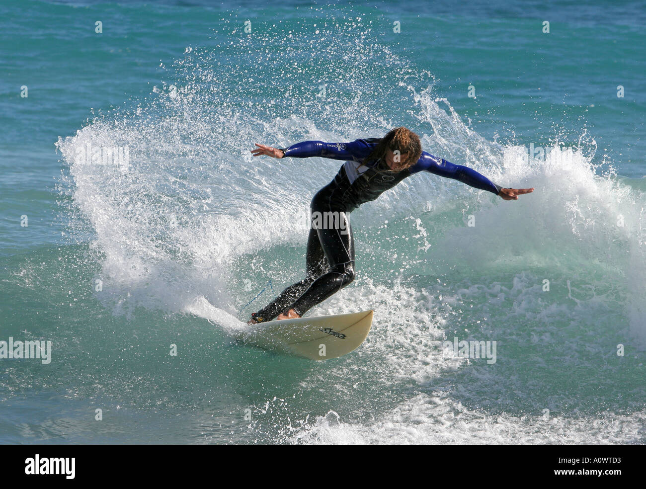 Good excellent experienced surfer carving or catching a big wave Catching a big wave in mojacar