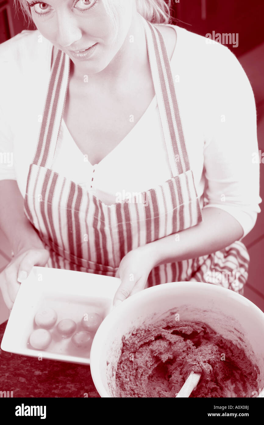 Young Woman Making a Cake Model Released Stock Photo Alamy
