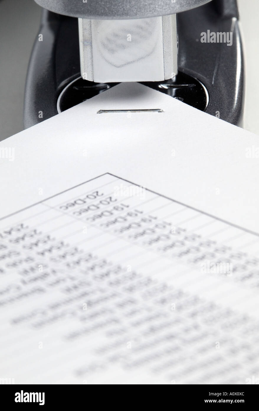 paperwork being stapled together Stock Photo