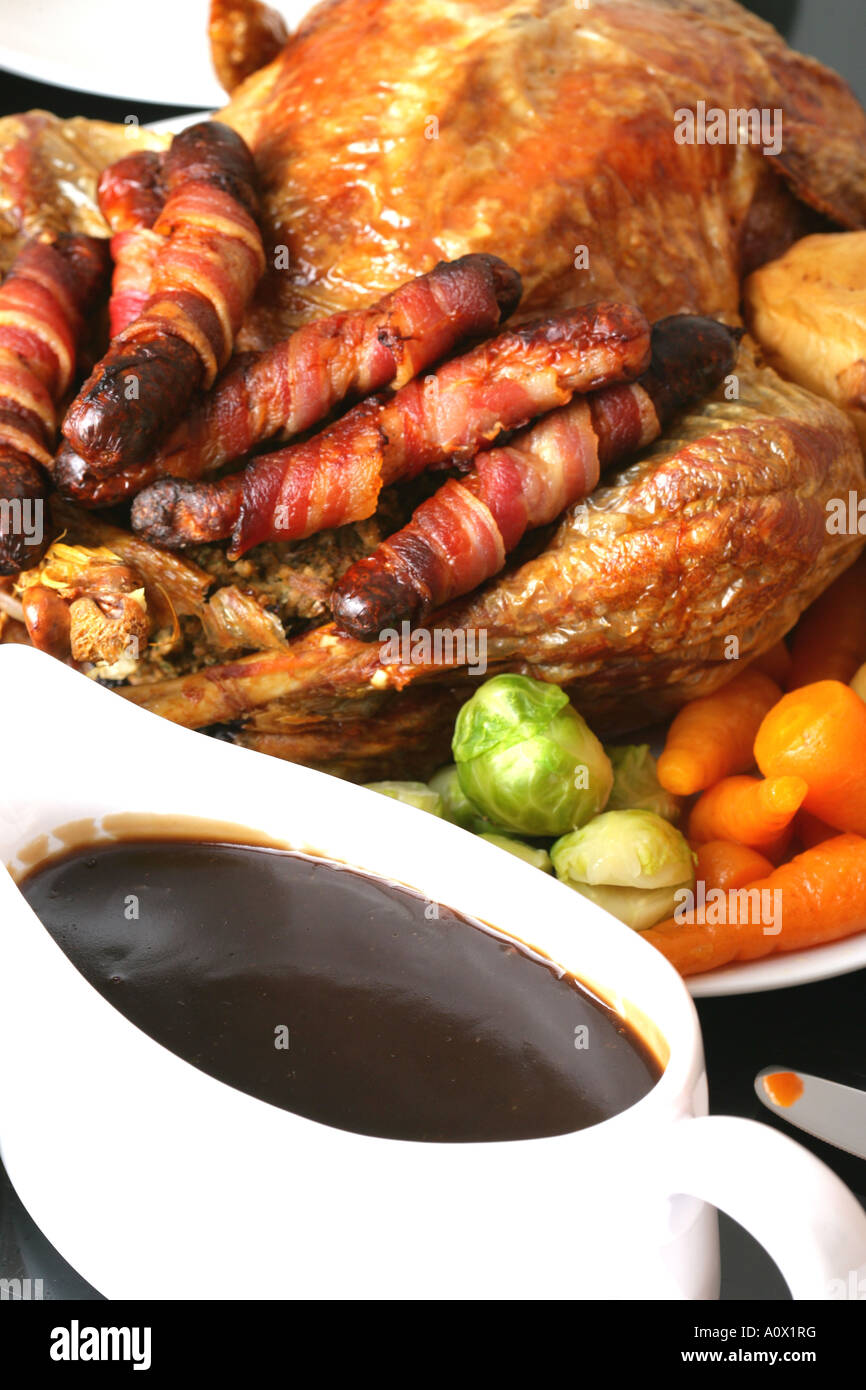 Authentic Traditional Roast Turkey Christmas Dinner With A Gravy Boat And No People Stock Photo