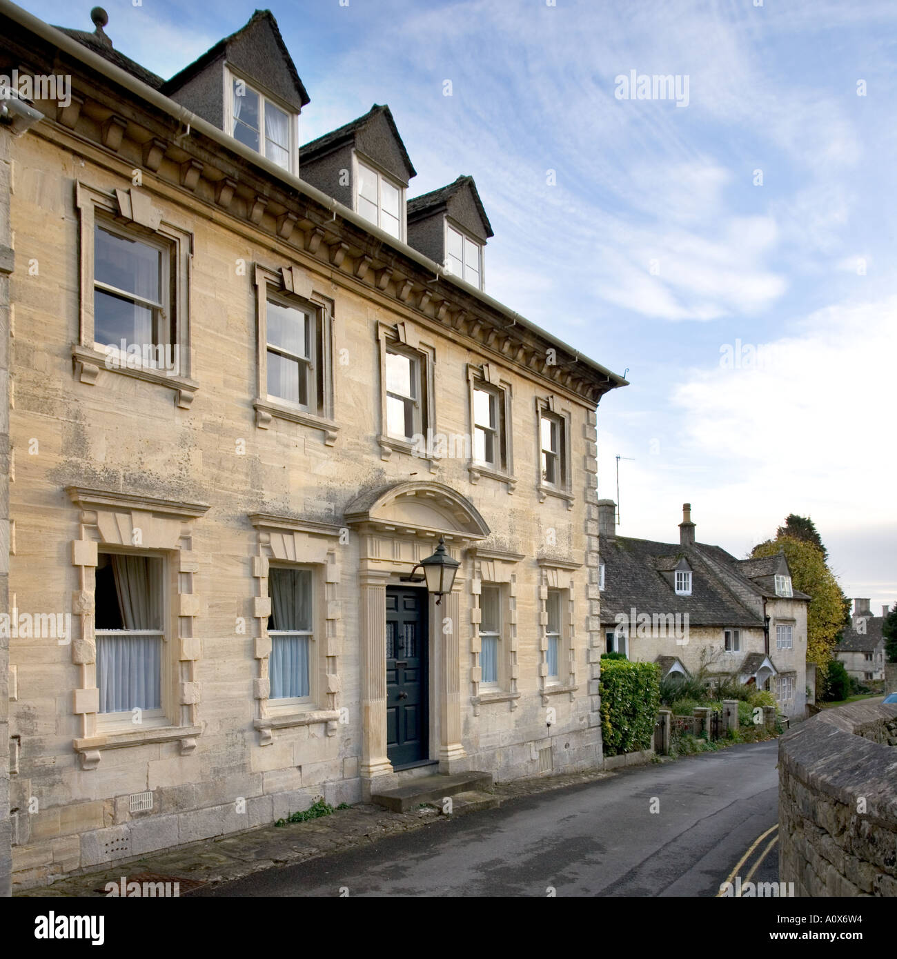 Autumn sunshine on cotswold stone houses, Painswick, Cotswolds