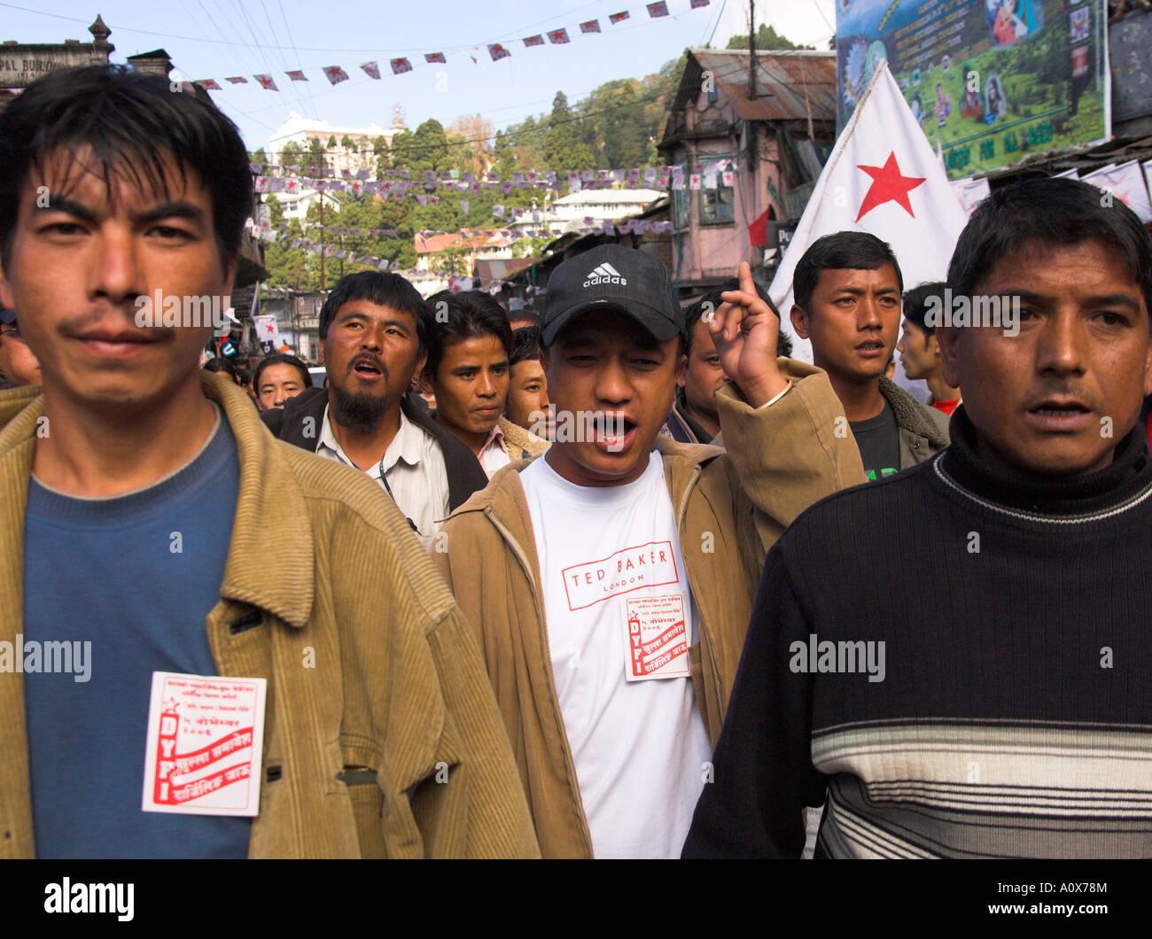 India West Bengal Darjeeling maoist demonstration in the streets of darjeeling group of men marching and yelling slogans Stock Photo