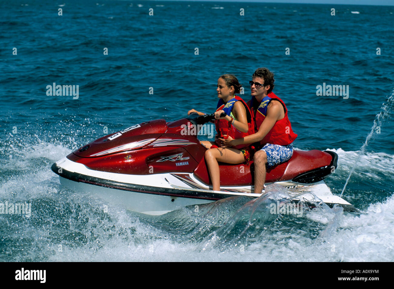 Couple on a jet ski Contadora island Las Perlas archipelago Panama Central America Stock Photo