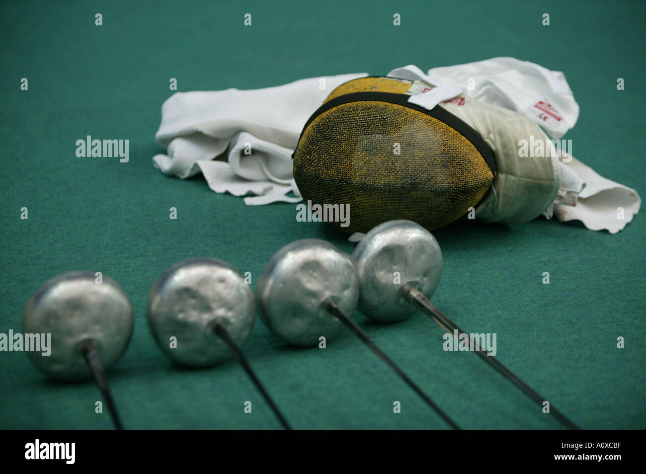 fencing epee gear on the floor Stock Photo