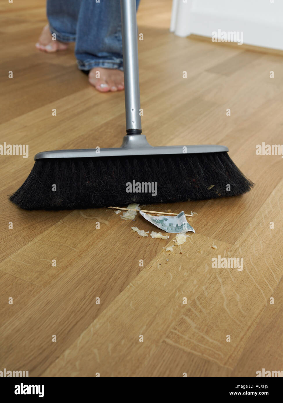 Woman sweeping up Stock Photo Alamy