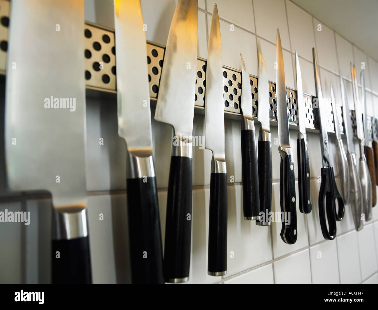 Row of knives and scissors Stock Photo Alamy