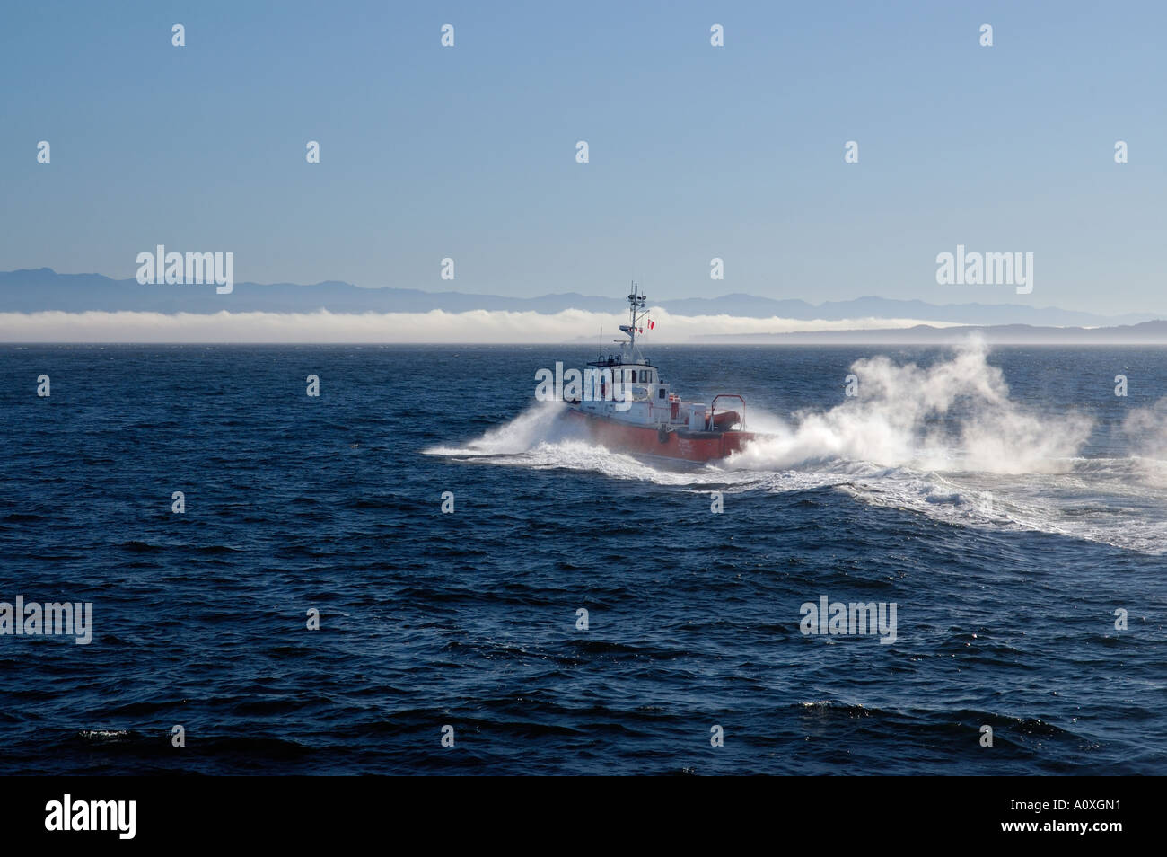 Canadian Patrol boat racing into Juan de Fuca Strait Stock Photo - Alamy