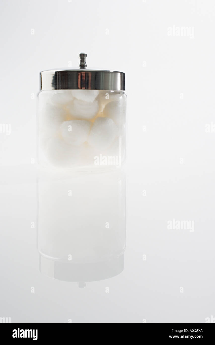 Jar of cotton wool balls Stock Photo Alamy