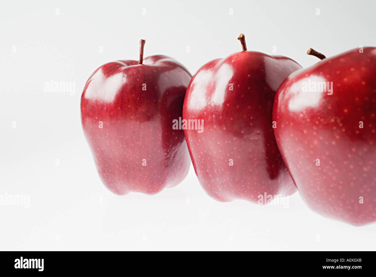 Three red apples Stock Photo