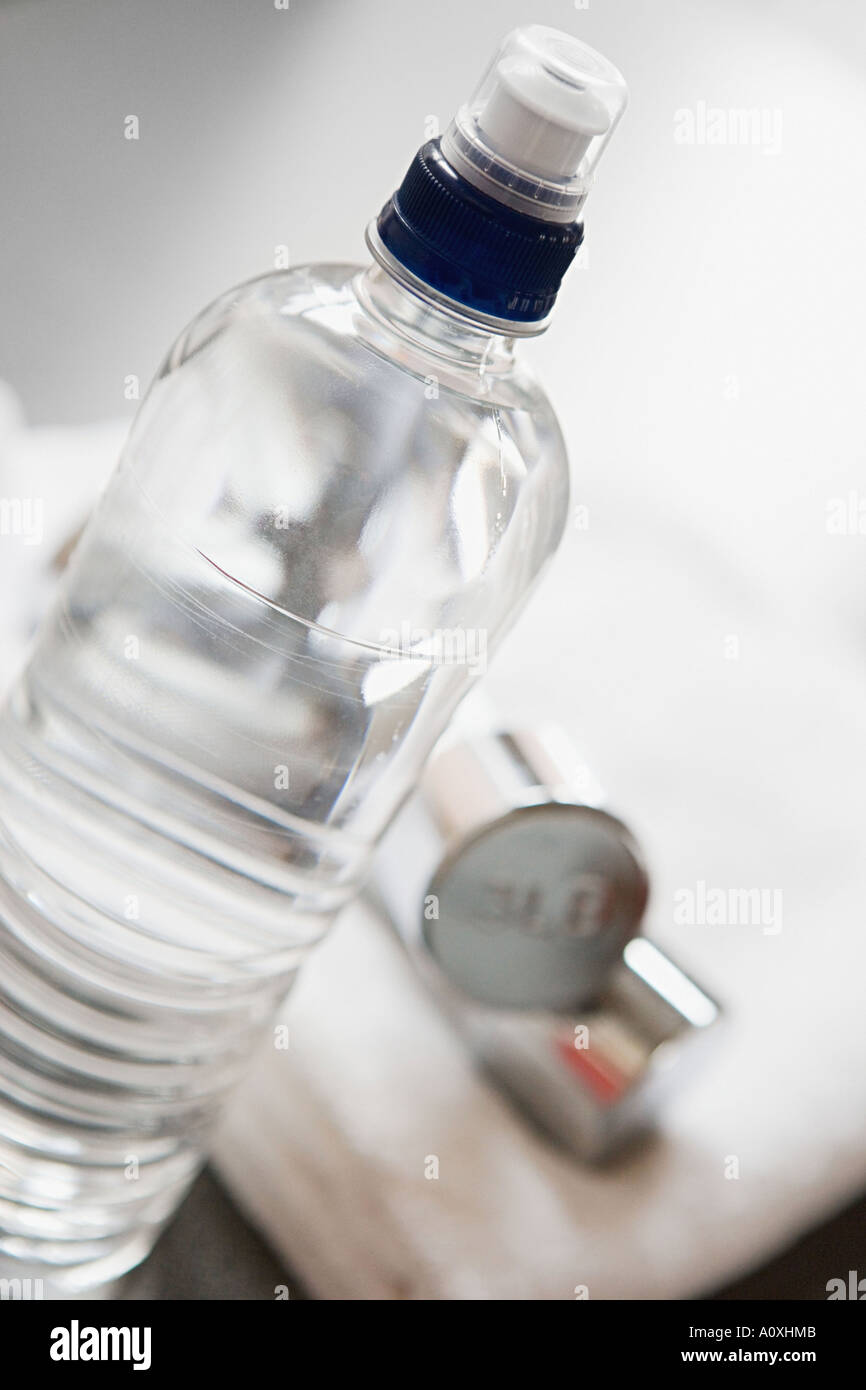 Bottle of water and a towel Stock Photo Alamy