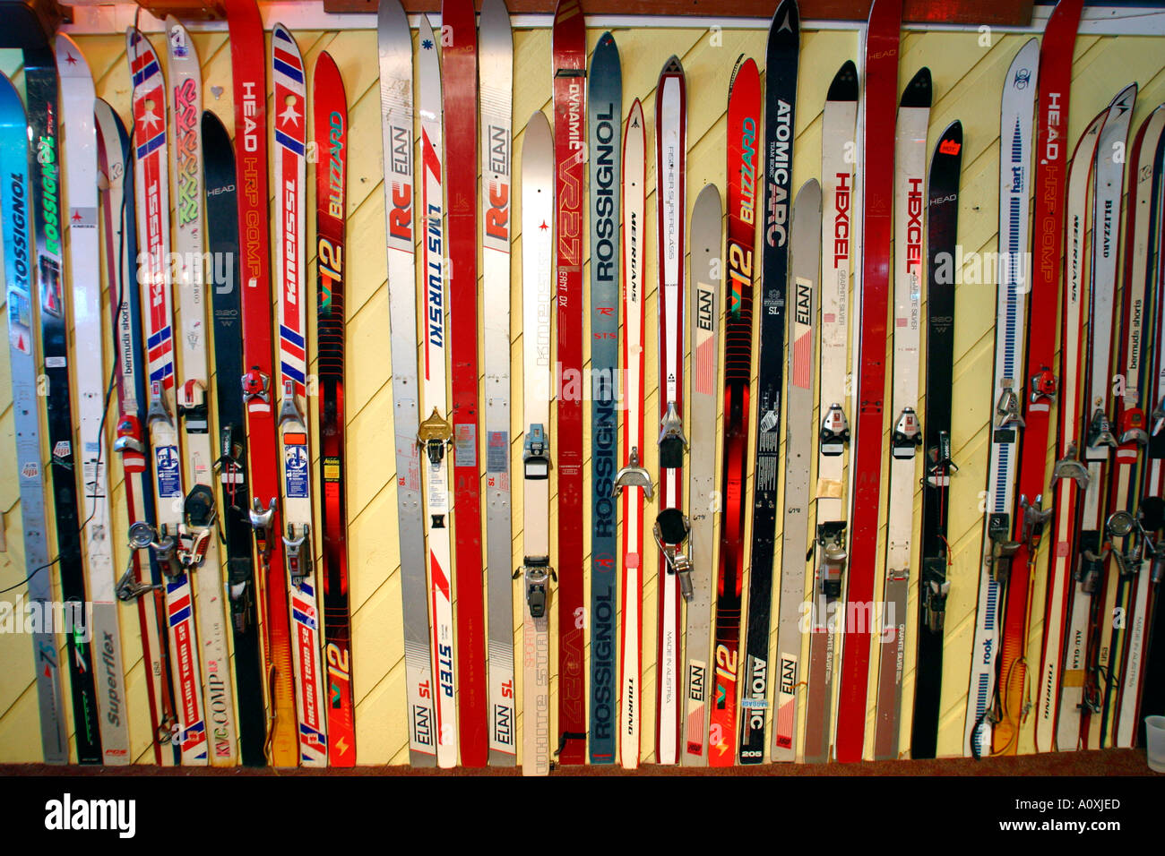 Vintage Skis lining wall of Ski Lodge Sunday River Ski Resort Bethel Maine Stock Photo