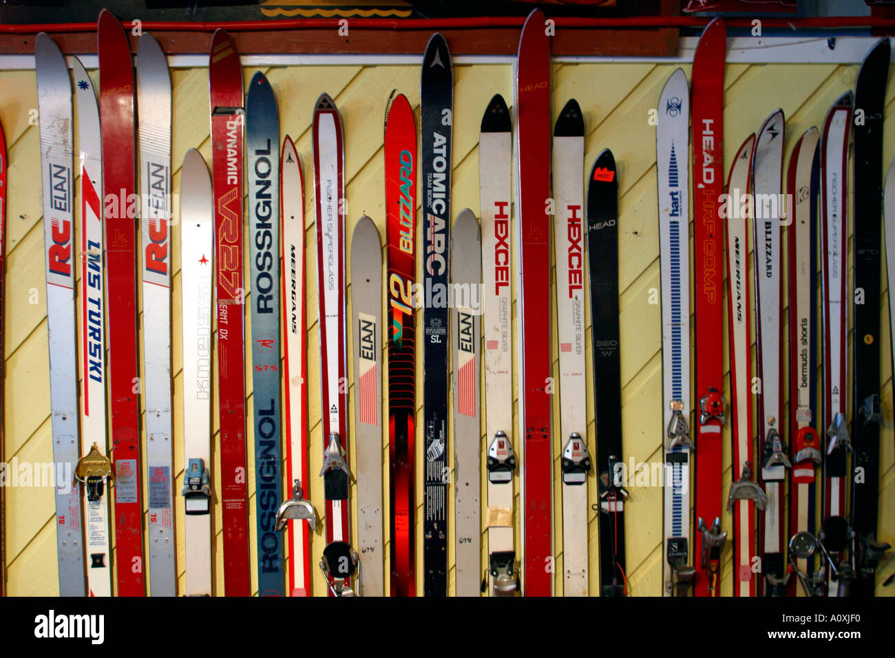Vintage Skis lining wall of Ski Lodge Sunday River Ski Resort Bethel Maine Stock Photo