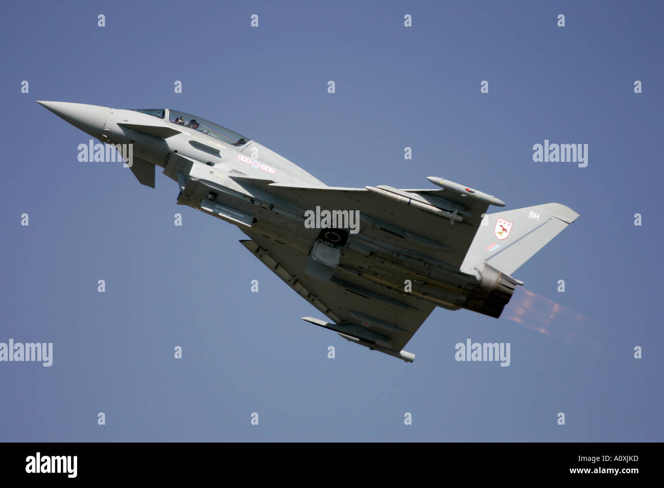RAF Typhoon T1 Eurofighter flies low on afterburner in blue sky RIAT 2005 RAF Fairford Gloucestershire England UK Stock Photo