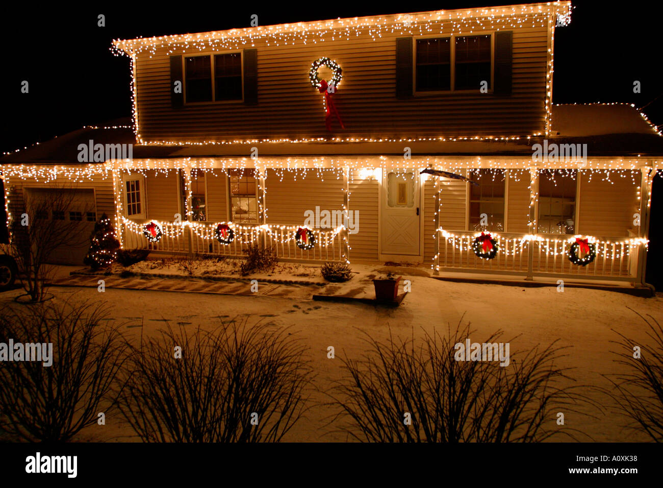 House Decorated with Christmas Lights Suburban New York Property