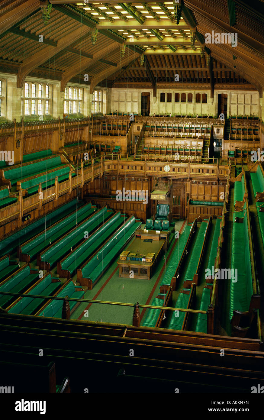 Interior of the Commons chamber Houses of Parliament Westminster London England United Kingdom Europe Stock Photo