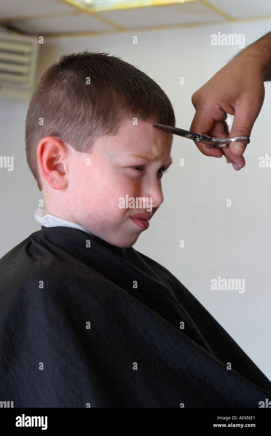Young Boy Getting Hair Cut Model Released Stock Photo - Alamy