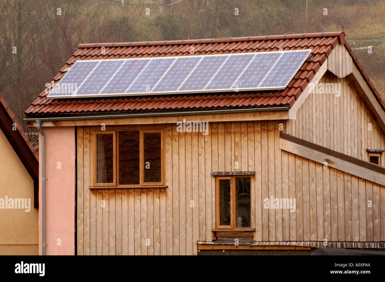 Self build ECO homes with solar panels on roof under construction at