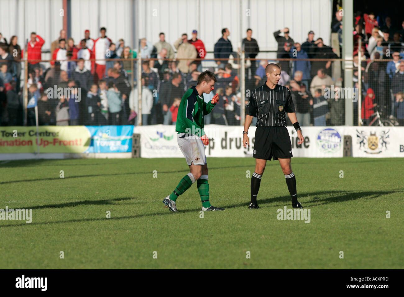 N Ireland player Andrew Cleary 2 suffers bloody nose during game Northern Ireland v Brazil Stock Photo