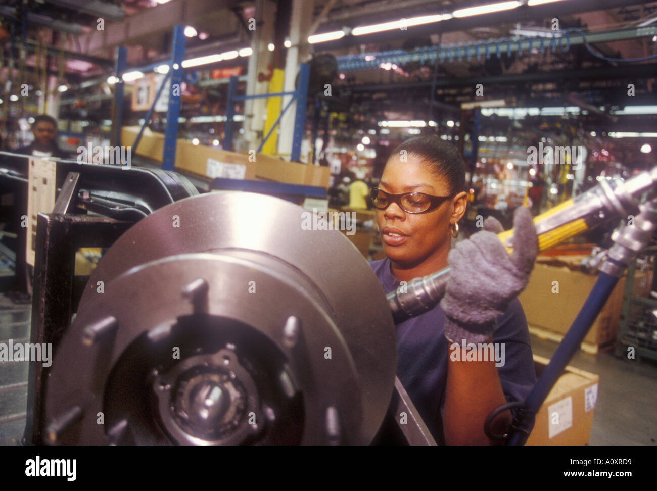 Worker at Recreational Vehicle Chassis Plant Stock Photo