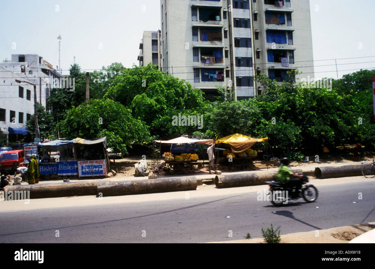 Lively street scene in the city of Delhi India Stock Photo