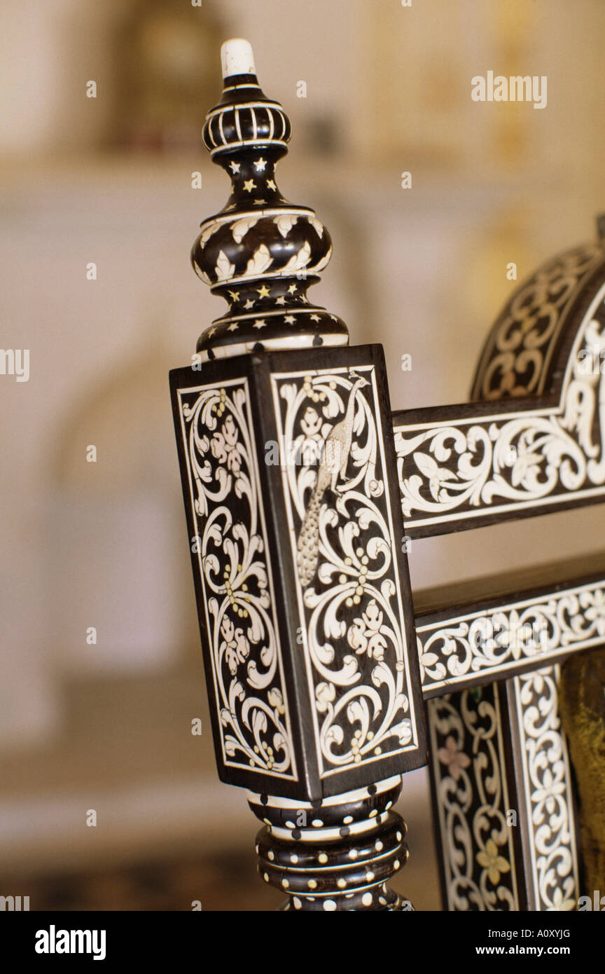 Ebony wood and ivory inlay detail on one of the pair of throne chairs