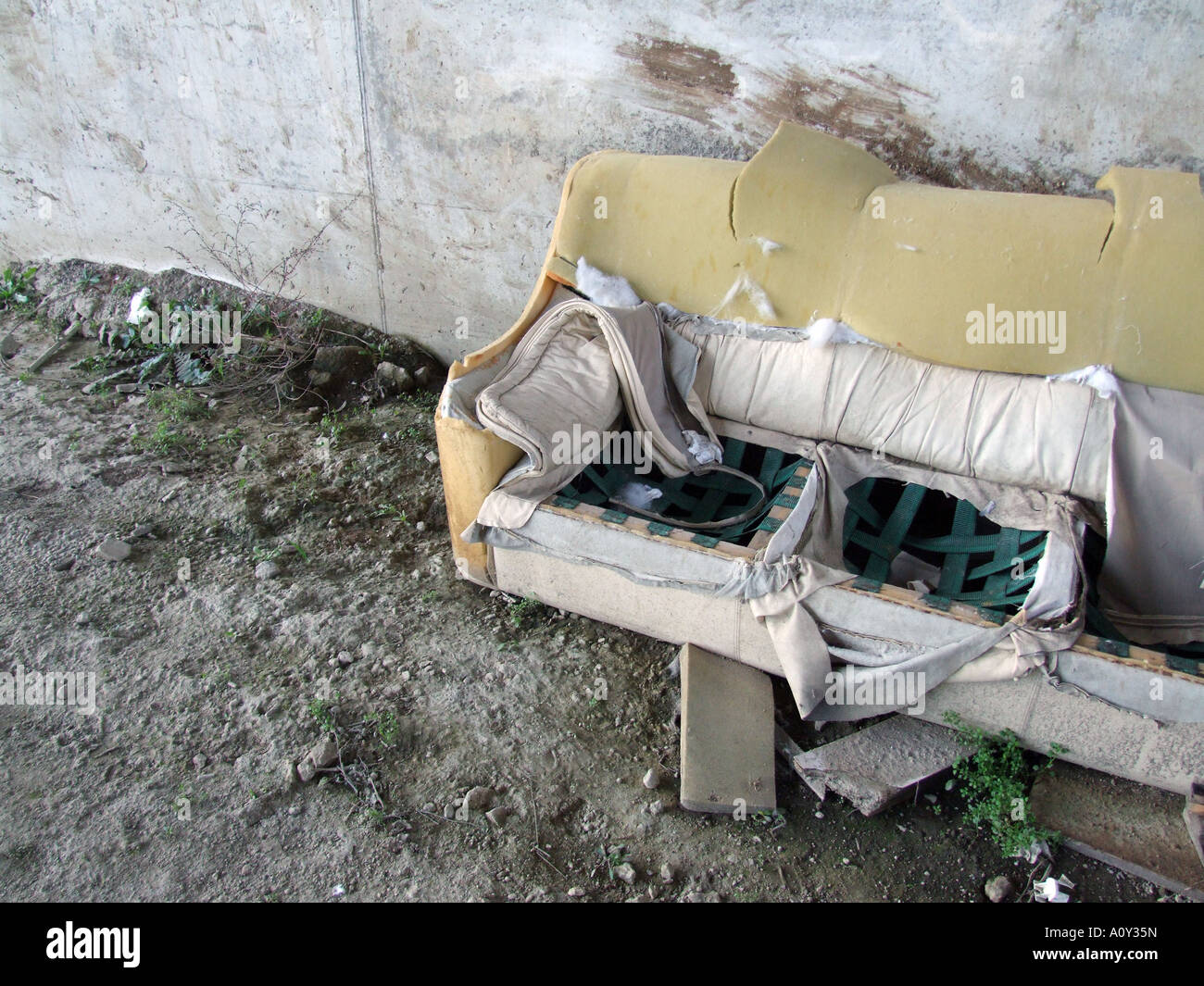 old sofa dumped on derelict ground Stock Photo Alamy