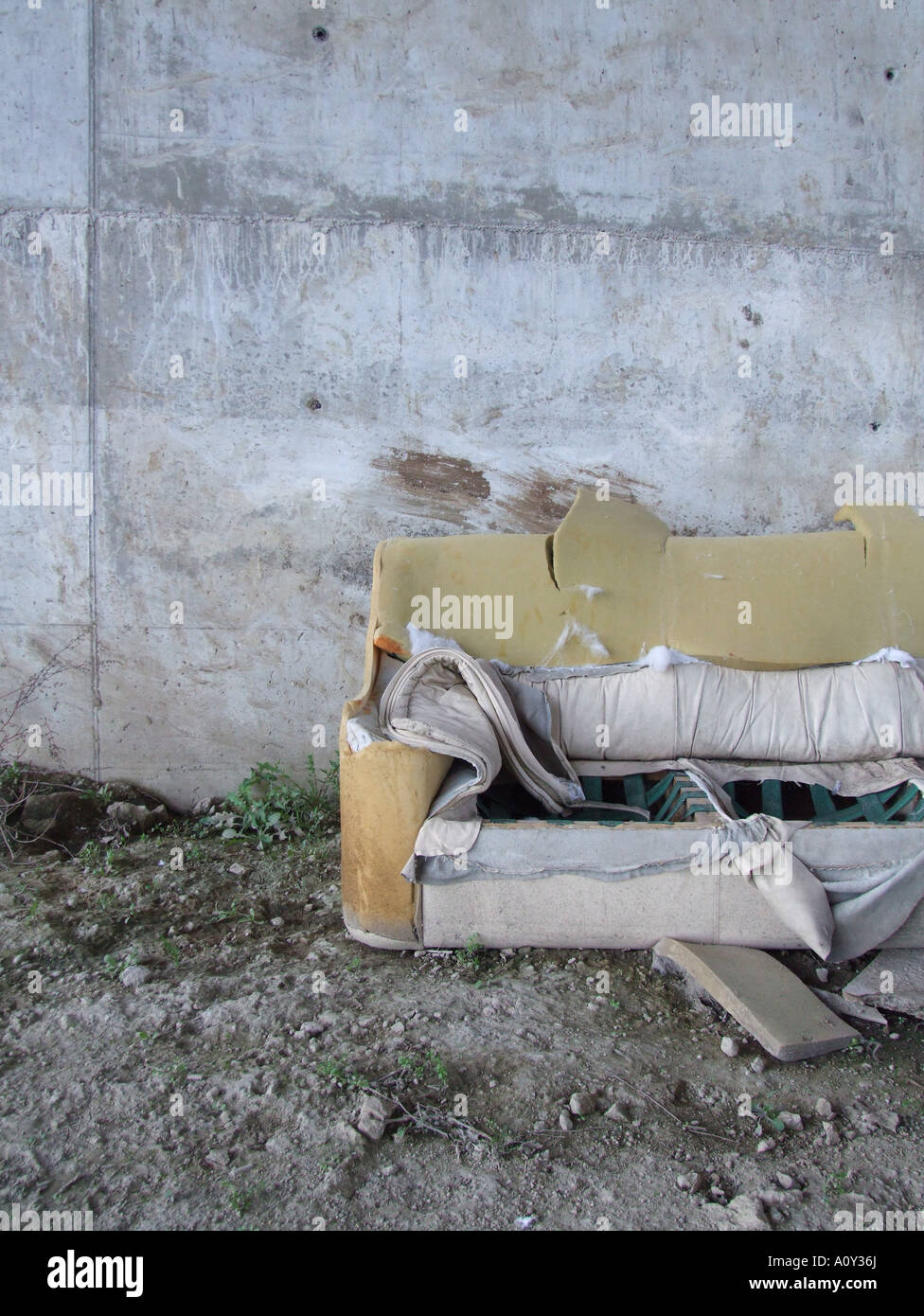 old sofa dumped on derelict ground Stock Photo Alamy