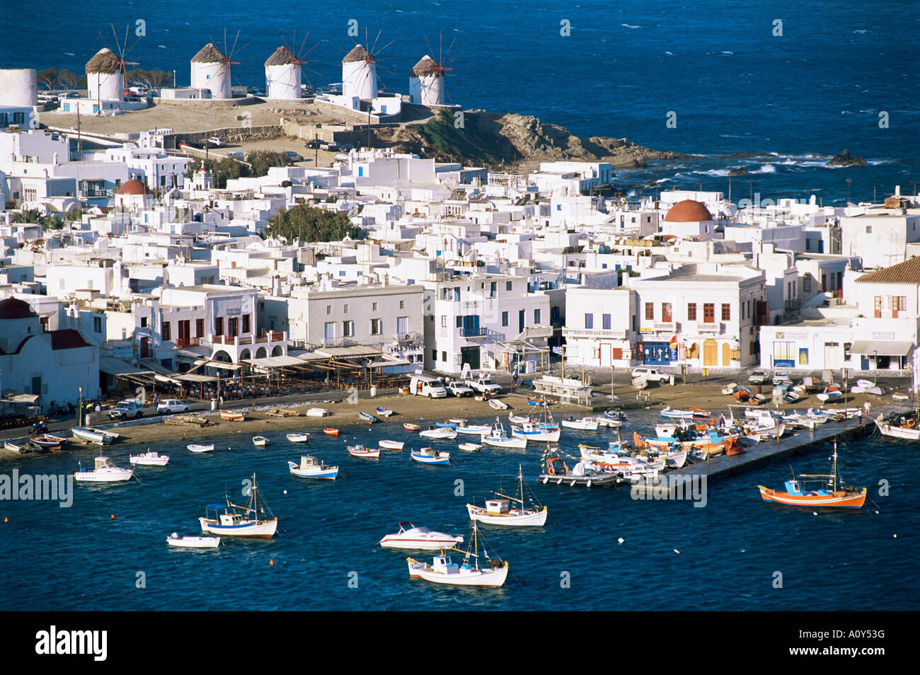 Town harbour and windmills Mykonos town island of Mykonos Cyclades Greece Europe Stock Photo