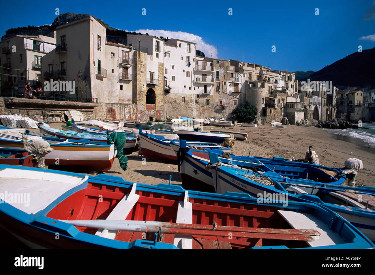 Fishing harbour and Porta Pescara beyond Cefalu island of Sicily Italy Mediterranean Europe Stock Photo