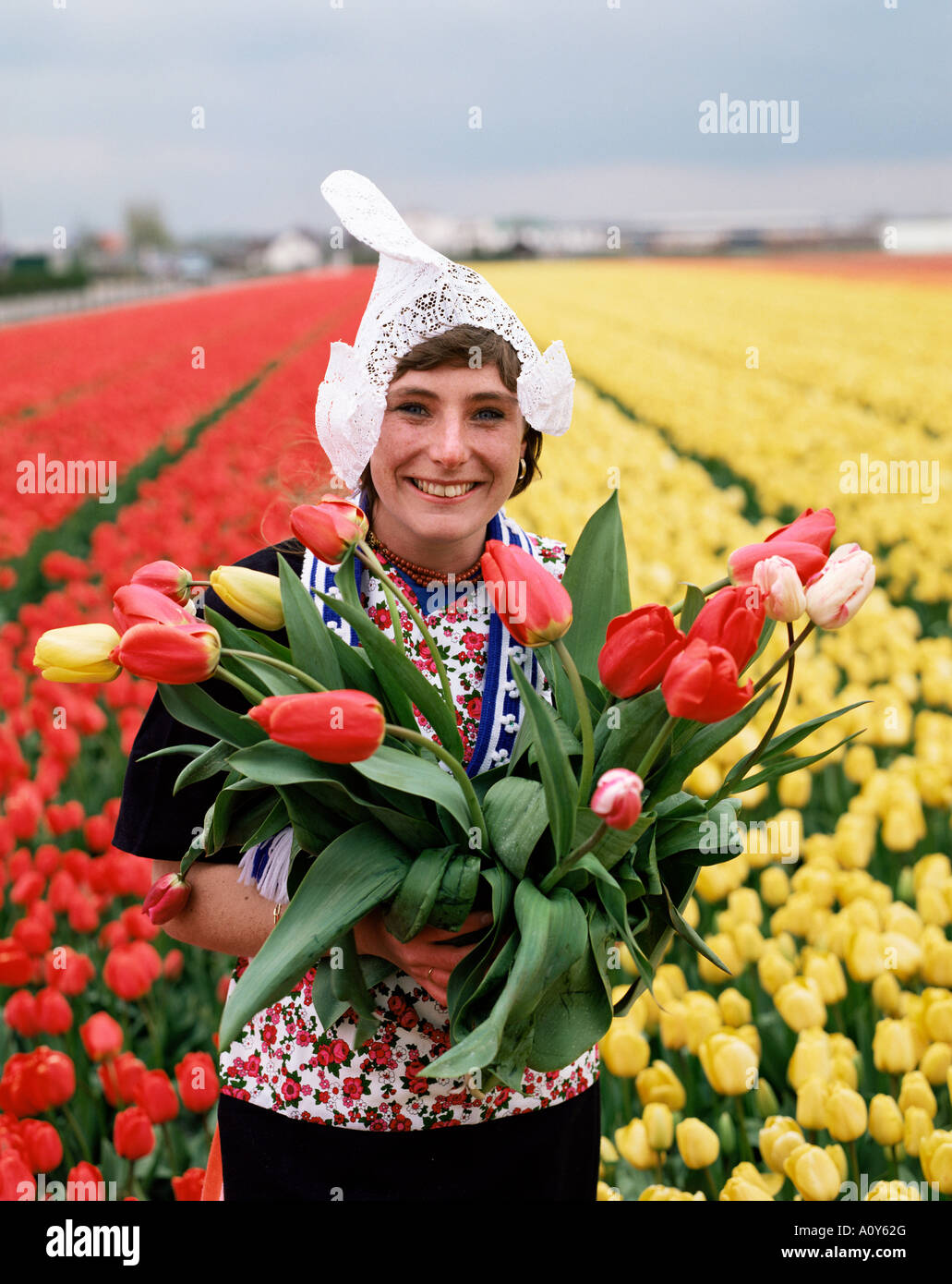 National costume and tulips Holland Europe Stock Photo Alamy