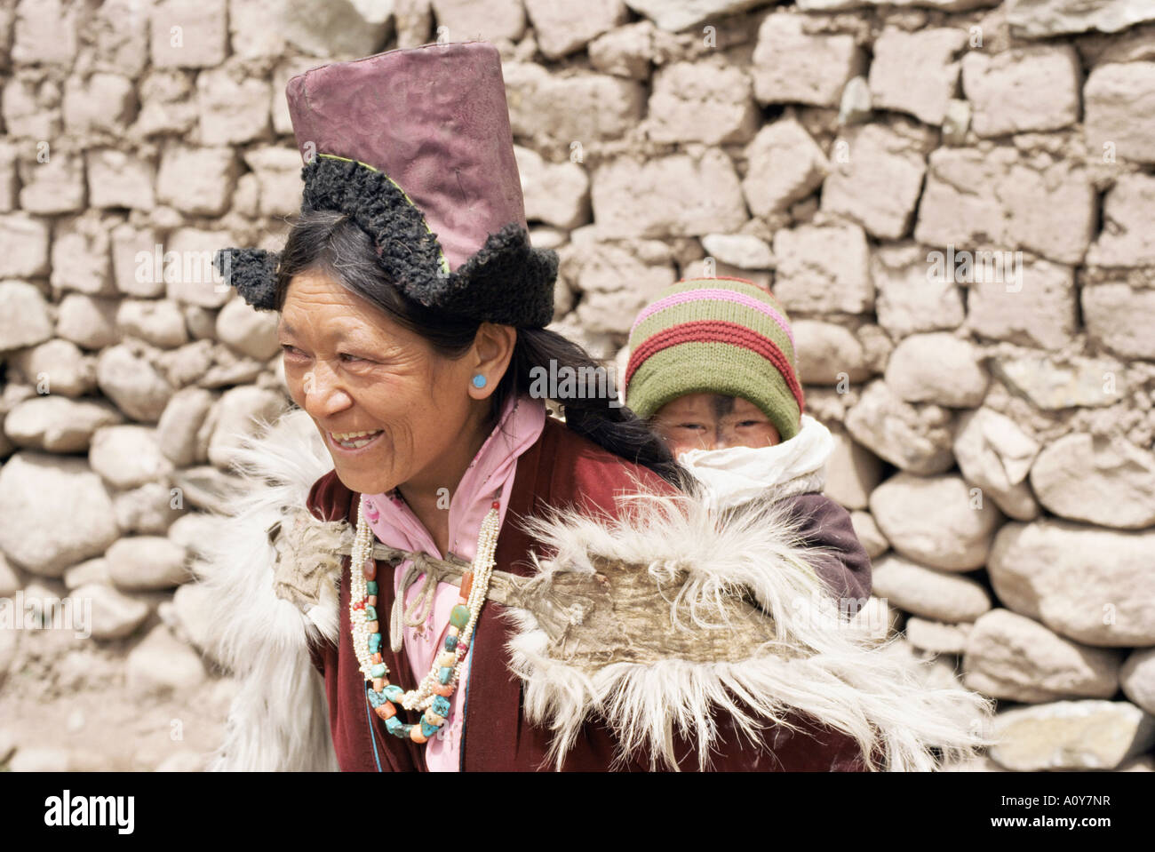 Indian woman carrying baby back hi-res stock photography and images - Alamy