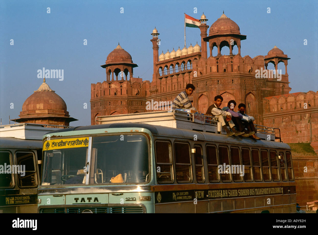 Indian people on a bus roof hi-res stock photography and images - Alamy