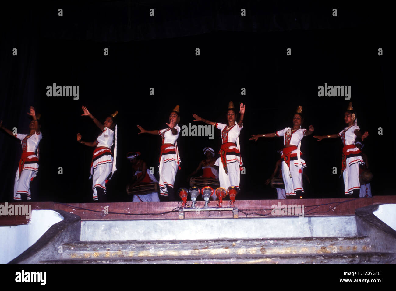 Sri Lankan dancing girls performs a traditional dance routine Stock Photo