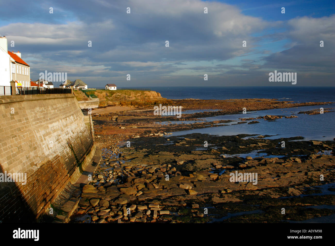 England Tyne and wear Cullercoats The sea wall built to defend the north tyneside village from the north sea Stock Photo