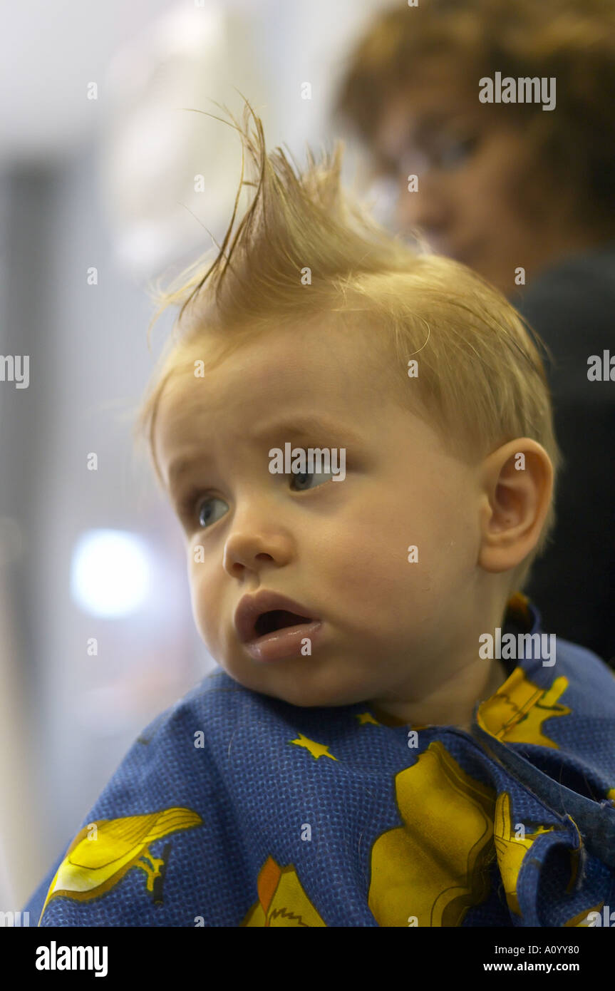 One Year Old Boy Sits In Barber Stool For First Haircut Baby Model
