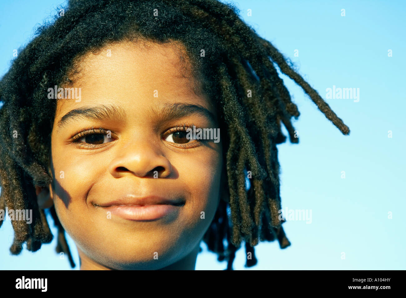 Young African boy smiling Stock Photo Alamy