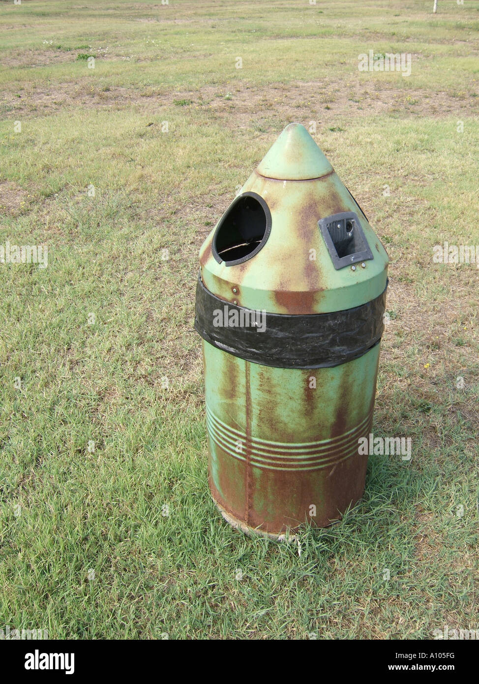 one dirty litter bin in park Stock Photo Alamy