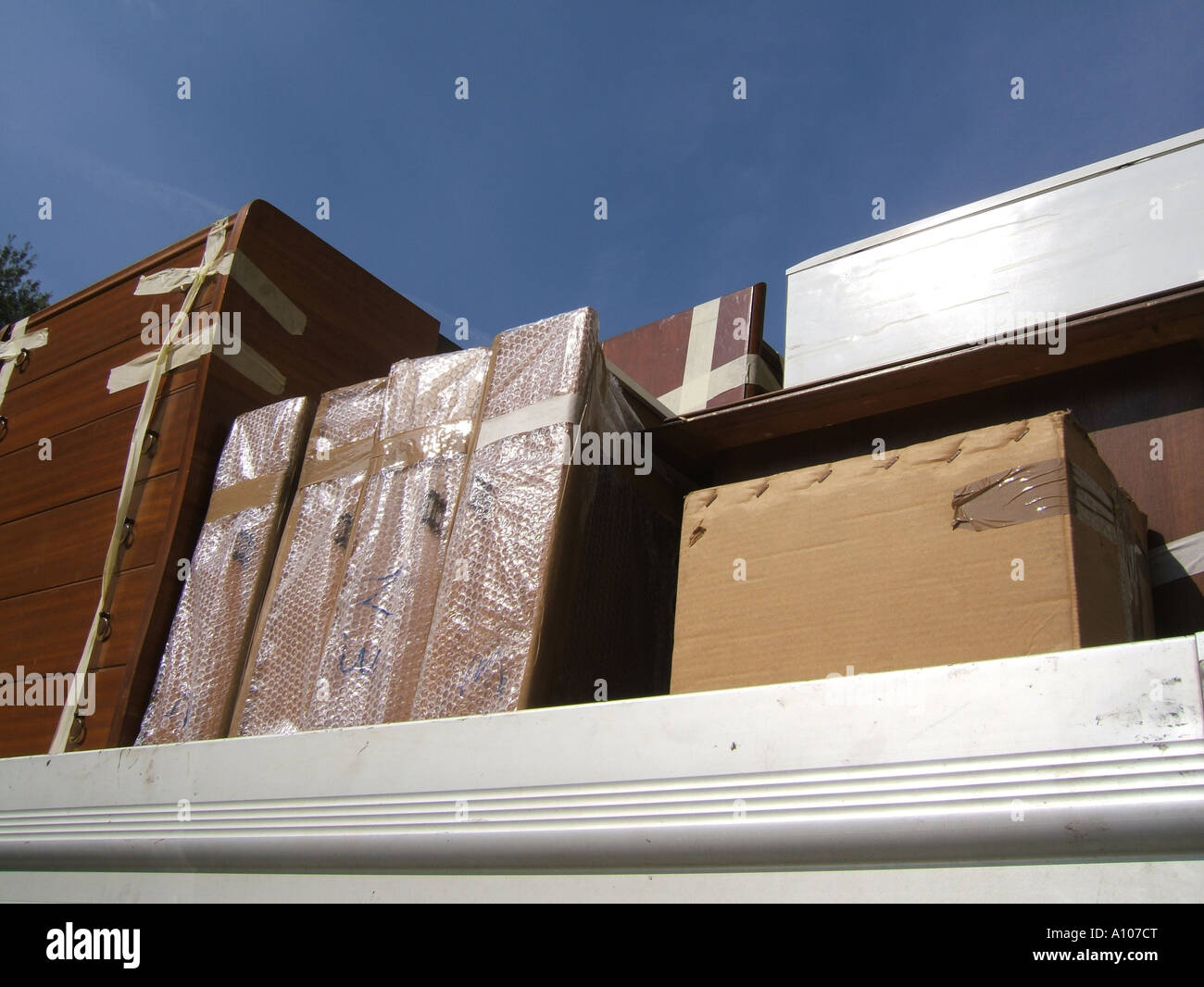 furniture on lorry in house move Stock Photo Alamy