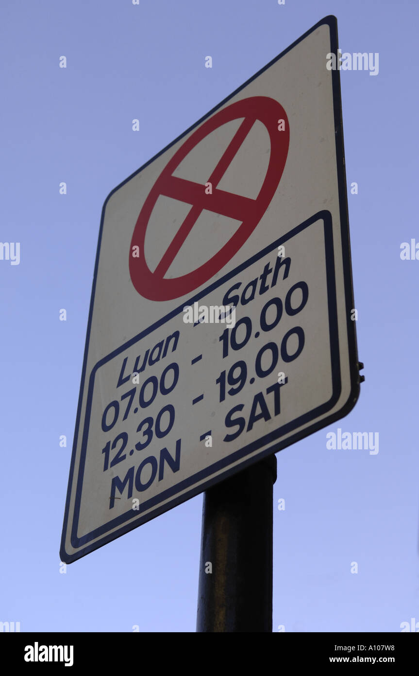 parking restrictions sign dublin ireland vertical blue sky Stock Photo