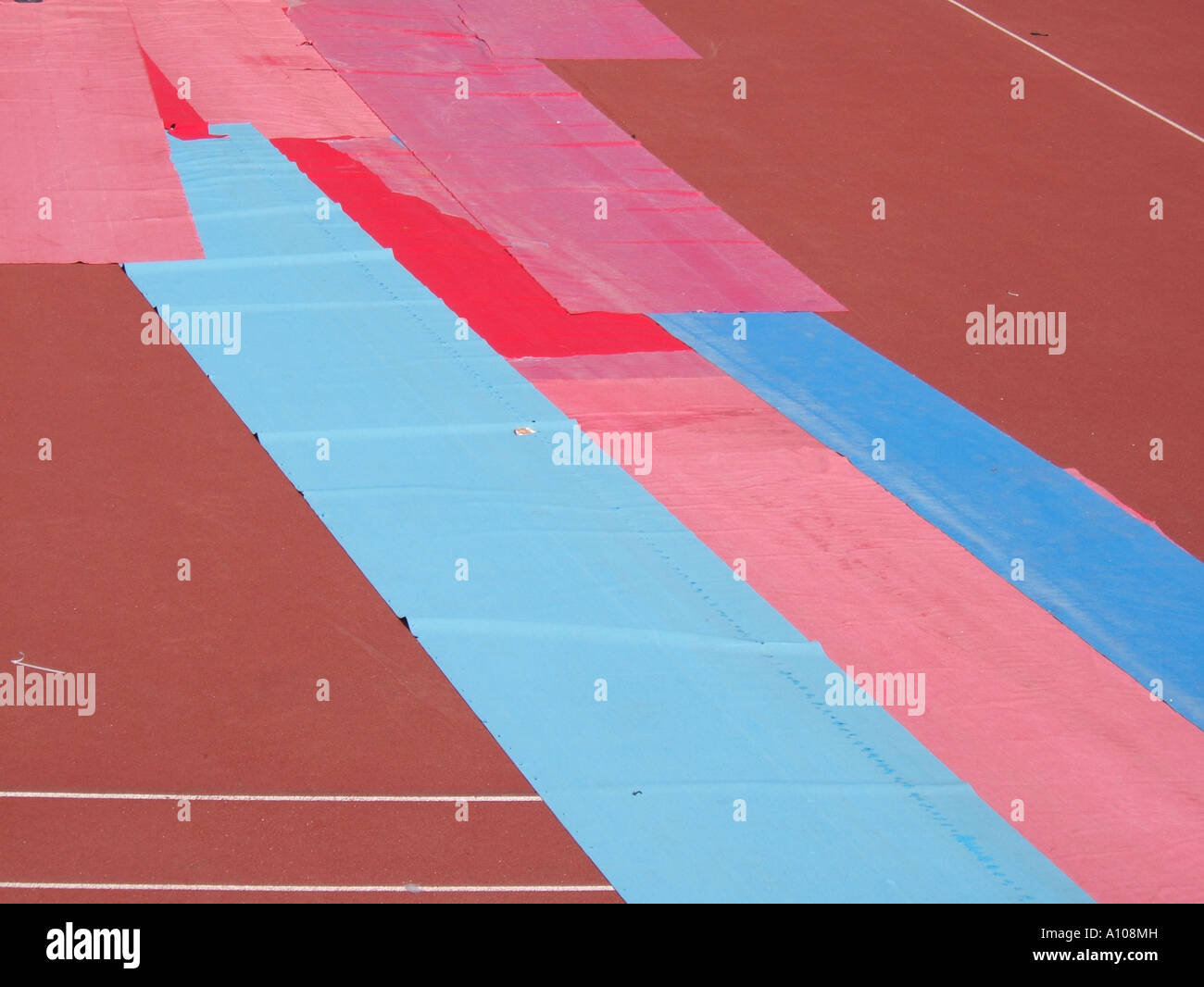 plastic covers on athletics track Stock Photo Alamy